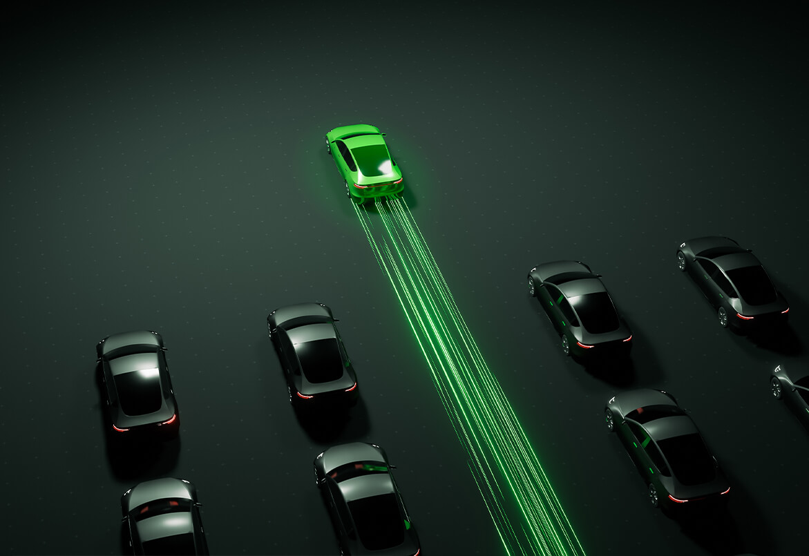 A green car emits digital lines, overtaking gray cars on a dark road, symbolizing autonomous driving technology.